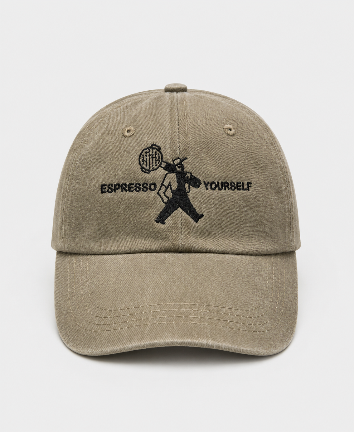 Beige cap with black embroidered design and text on a white background