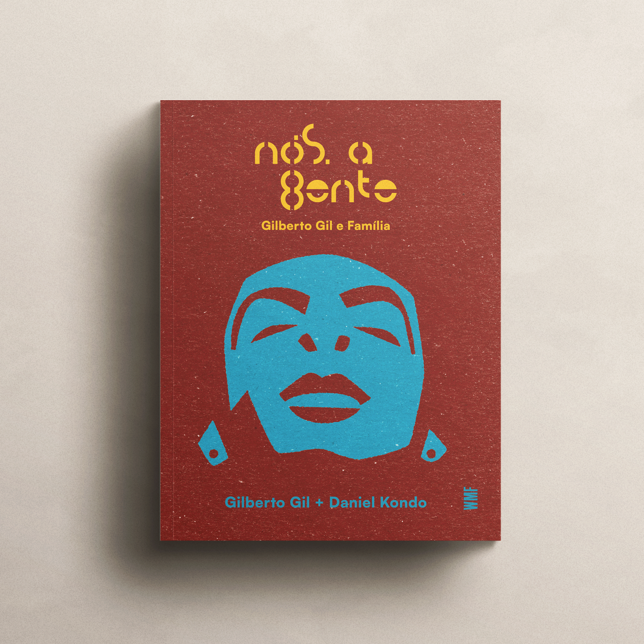 Book cover with a blue face illustration of Gilberto Gil and yellow text on a beige background
