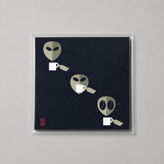 Framed artwork with alien faces holding coffee cups on a starry night background